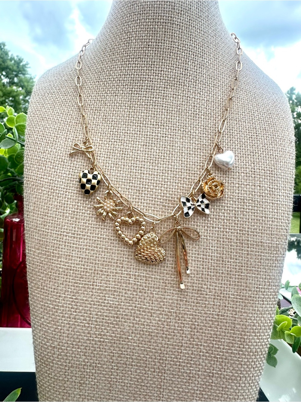 Gold-Tone Heart & Bow Charm Necklace with Black-White Accents